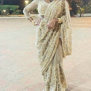 Elegant Gold Embroidered Saree